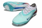 Nike Phantom 6 Elite Low FG Firm Ground Soccer Cleats in Pistachio Frost and Hyper Orange.