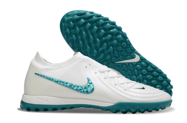 Nike Phantom GX II Elite Society football shoe in white and green, designed for optimal grip and agi.