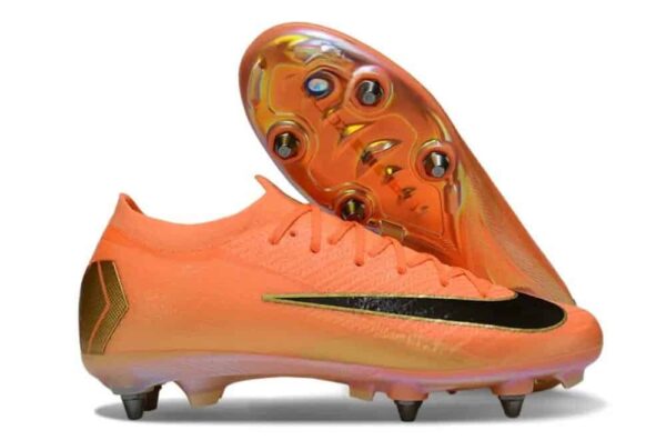 High-performance Nike Jr. Mercurial Vapor 16 Pro football cleats in vibrant orange and black.