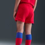 Psg third kit kids 2025/26 shorts in red with blue accents, perfect for young football fans.