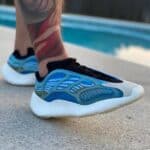 Nike blue and white athletic sneakers with breathable mesh and cushioned sole for comfort and perfor.