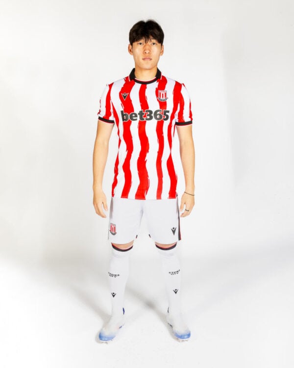 Stoke City 2025/26 home football jersey with red and white stripes, official club logo, and Bet365 s.