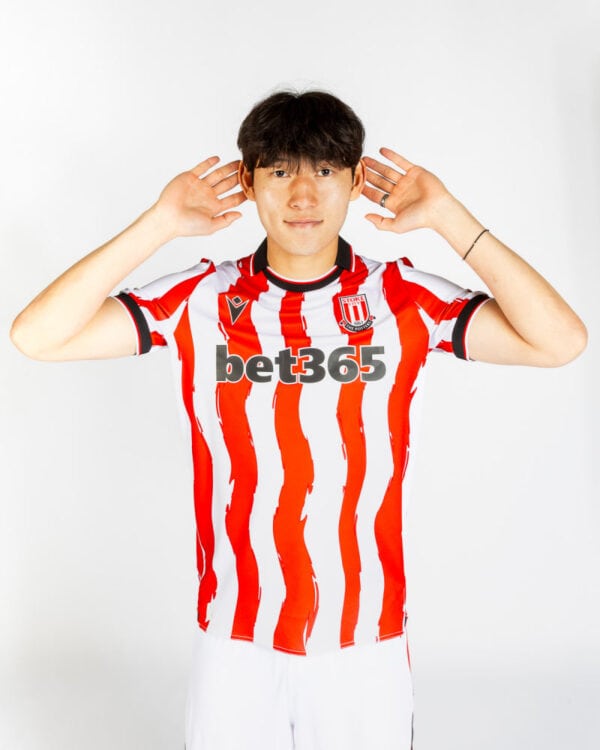 Stoke City 2025/26 home football jersey with red and white vertical stripes, featuring Bet365 sponso.