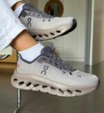 Cloudtilt Cinder Eclipse running shoes for men and women.