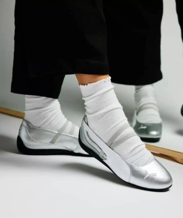 Puma Speedcat racing shoes with sleek silver design and comfortable fit. Perfect for sports and casu.