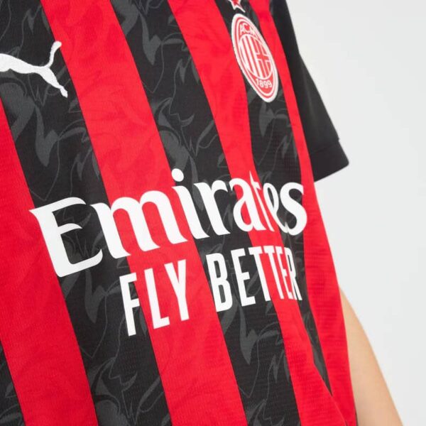 AC Milan youth home football jersey 2025/26 with team logo and sponsor.