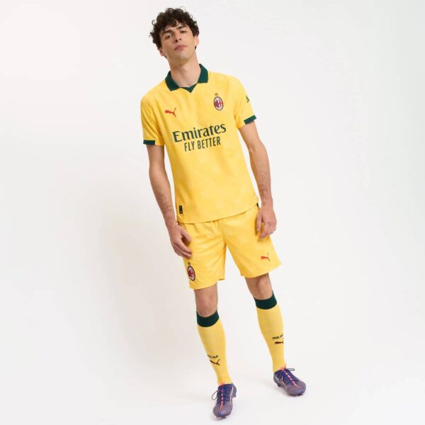 AC Milan third football jersey 2025/26 with yellow design and green accents.