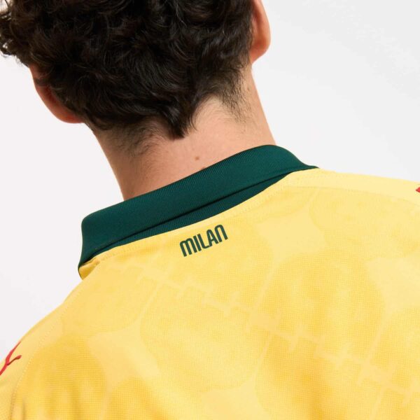 AC Milan third football jersey 2025/26 with team logo and vibrant yellow design.