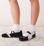 Puma Speedcat shoes with white socks, stylish and comfortable for sports.