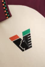 Nike football logo patch with colorful design on white background.