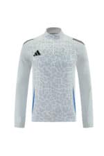 Leopard print Adidas track suit in light grey with blue stripes, perfect for sports and casual wear.