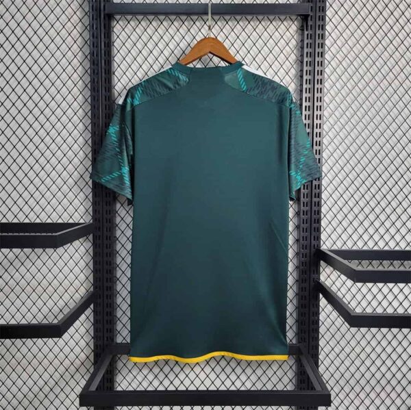 Portland Timbers 23/24 home soccer jersey in green with yellow accents.