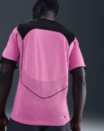 Nike Total 90 pink soccer jersey for men, lightweight and breathable sportswear.
