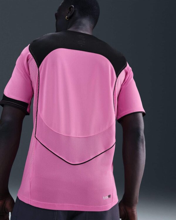 Nike Total 90 pink soccer jersey for men, lightweight and breathable sportswear.