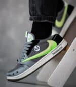 Travis Scott x Jordan 1 Low OG SP sneakers with Hoonigan Ford Mustang design.