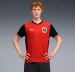 Austria national football team home jersey 2026, red and black design with Puma logo.