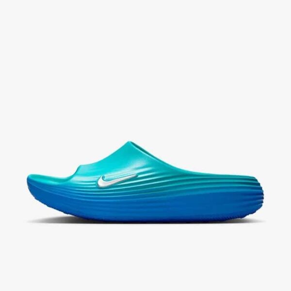 Nike ReactX Rejuven8 Slide in blue gradient for comfortable casual wear.