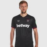 West Ham United black football jersey featuring Betway sponsor, club crest, and Umbro logo, perfect.