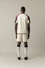 Football jersey and shorts set for athletes, back view.