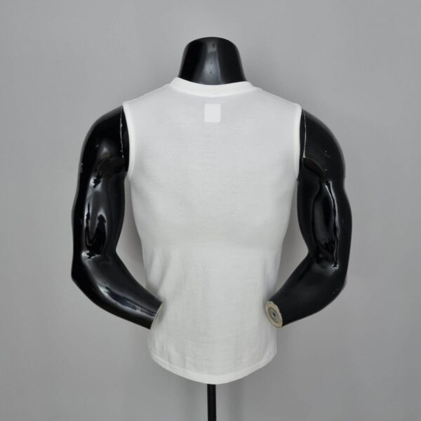 Nike Cut Shirt in white, sleeveless athletic top for sports and casual wear.