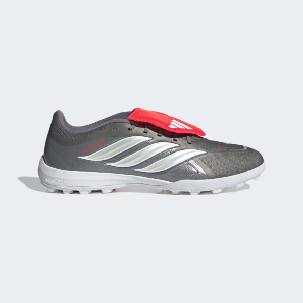Football shoes with predator league fold-over tongue for turf play.