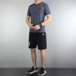 Adidas men's athletic set with blue T-shirt and black shorts, perfect for sports and casual wear.