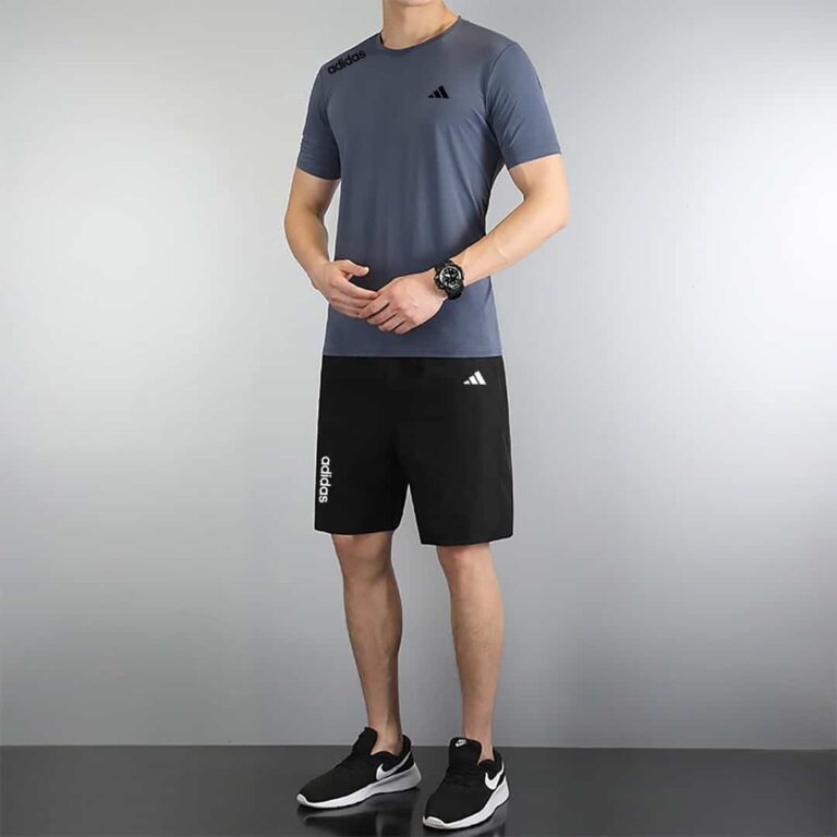 Adidas men's athletic set with blue T-shirt and black shorts, perfect for sports and casual wear.