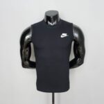 Nike Cut Sleeveless Shirt in black with white logo, perfect for sports and casual wear.