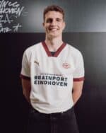 Men's PSV Eindhoven away football jersey 2023-24, white with maroon accents, featuring Puma logo and.