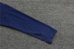 Close-up of Portugal football training suit sleeve in navy blue, 2023/24 season.
