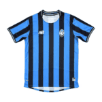 Soccer jersey with blue and black vertical stripes, NB logo on the right chest and a club crest on the left chest, short sleeves.