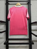 Pink Adidas football jersey, lightweight and breathable sportswear for training and matches, featuri.