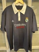 Authentic Real Madrid away football jersey, 2023/24 season, black with white collar.