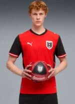 Austria national football team home jersey for 2026 with red and black design.