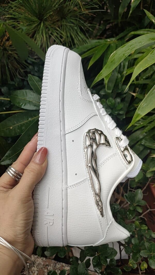 Air Force Low 1 ‘Molten Metal’ sneaker with metallic accents.