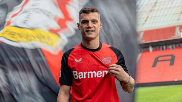 Official Bayer Leverkusen 2024/25 home football jersey with team logo and sponsor.