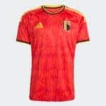 Red Belgium national football jersey with gold Adidas logo and crest on the chest, yellow-black trim at collar and sleeves