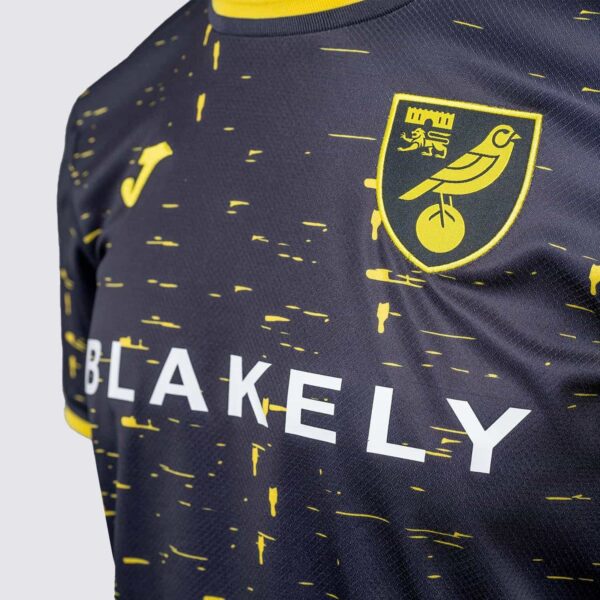 Authentic Norwich City away football jersey for 2024/25 season, featuring club crest and modern desi.