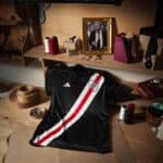 Authentic River Plate pre-match football jersey 2023/24, black with red and white diagonal stripes,.