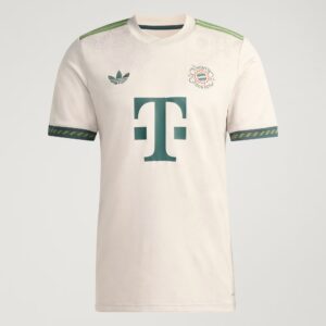 White Bayern Munich soccer jersey with green accents, crest on left chest and large teal sponsor logo center.