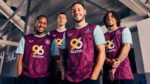 Burnley FC 2024/25 home football jersey with club crest and purple design.