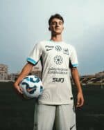 Al-Ittihad football jersey for 2025/26 season with sponsor logos and team crest.