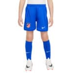 Youth Atlético Madrid football kit with team crest and Nike logo, perfect for young fans.