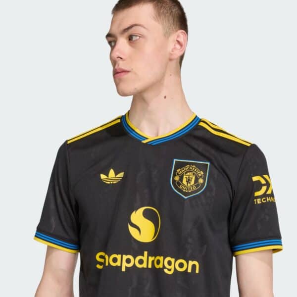 Man United third football jersey 2025/26 with black, yellow, and blue accents.