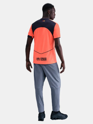 Unisex football jersey for BRC 2025/26, featuring vibrant orange and navy design.