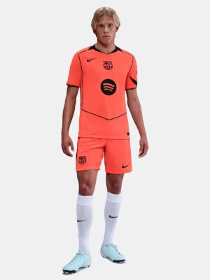 Third Short for FC Barcelona 2025/26 season, vibrant orange color with team logo.