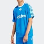 Adidas Adicolor blue T-shirt with iconic logo and sporty design.