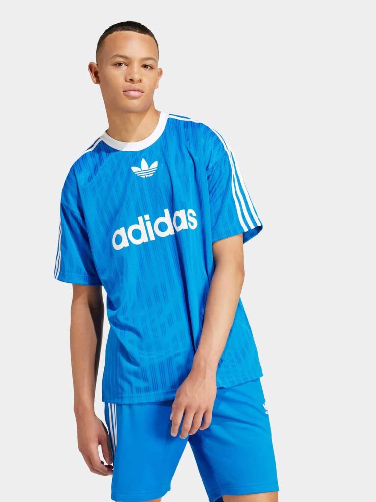 Adidas Adicolor blue sports T-shirt for youth, comfortable and stylish. Perfect for casual wear and.