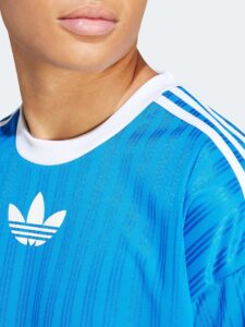Blue adidas Adicolor T-shirt with white logo and stripes.