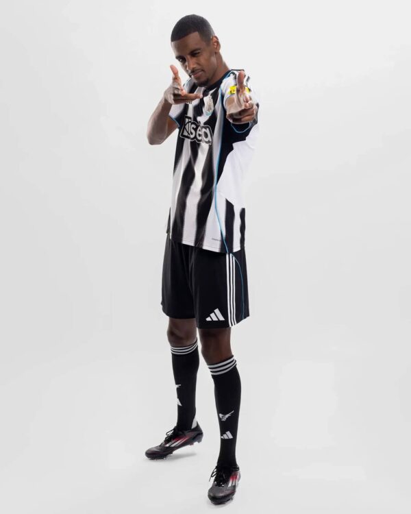 Newcastle United 2025/26 home football jersey, black and white stripes, official club kit.